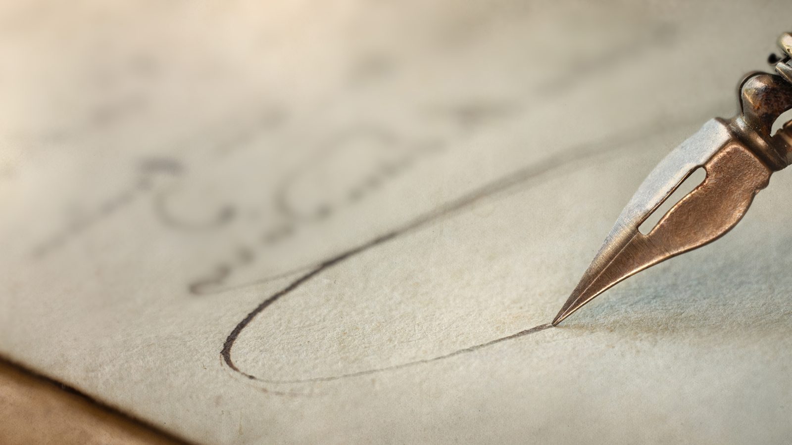 A fountain pen writing on a document