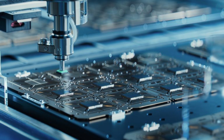 Pick and place machine assembling a circuit board