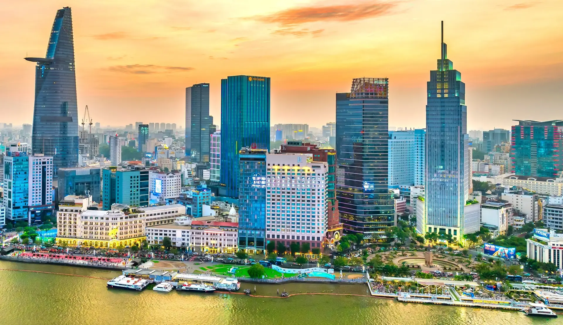 The Ho Chi Minh City centre skyline at sunset across the Saigon River