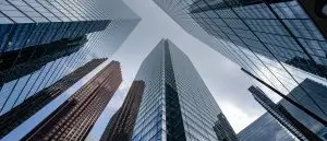 Glass towers converging upward, the listed and unlisted capital an equity raising reaches