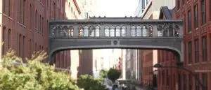 A skybridge joining two buildings, the structure a small business rollover preserves