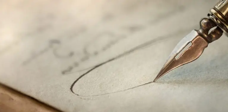 A fountain pen writing on paper