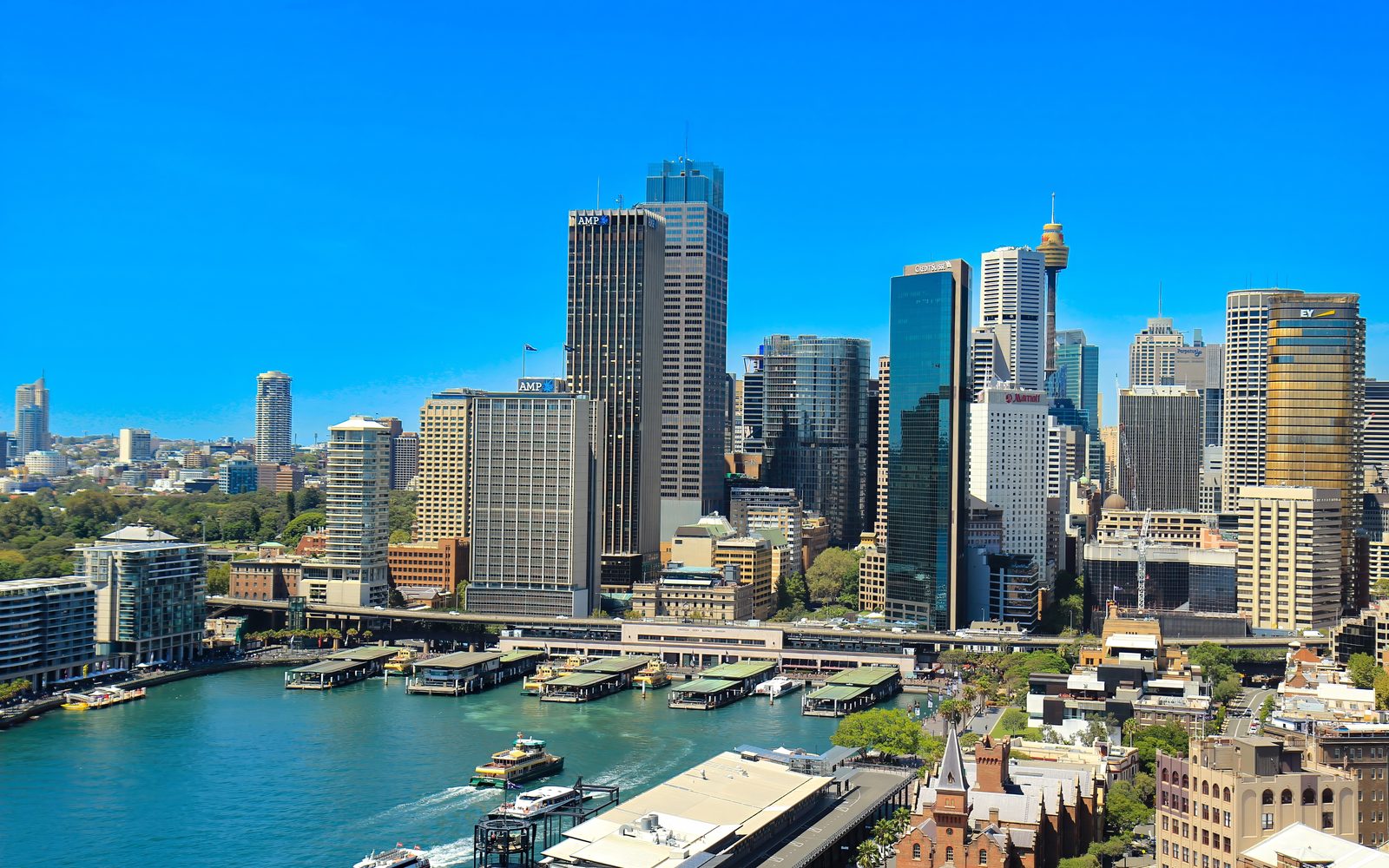 Sydney's central business district rising behind Circular Quay on a clear day